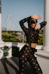 TOP CROPPED MANGA LARGA DEDINHO NEGRO ESTRELLAS BRONCE